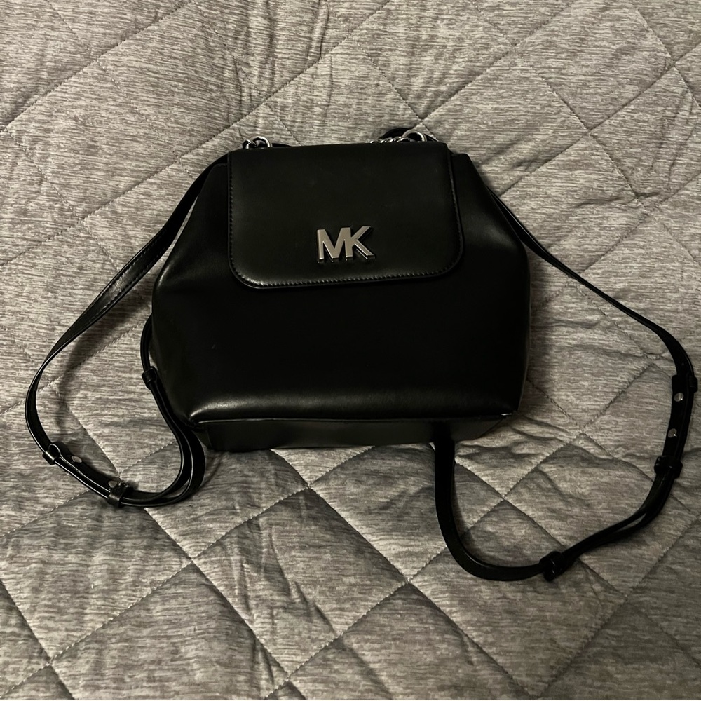 Michael Kors Mott plain leather, silver chain strap, turnbuckle handbag/backpack